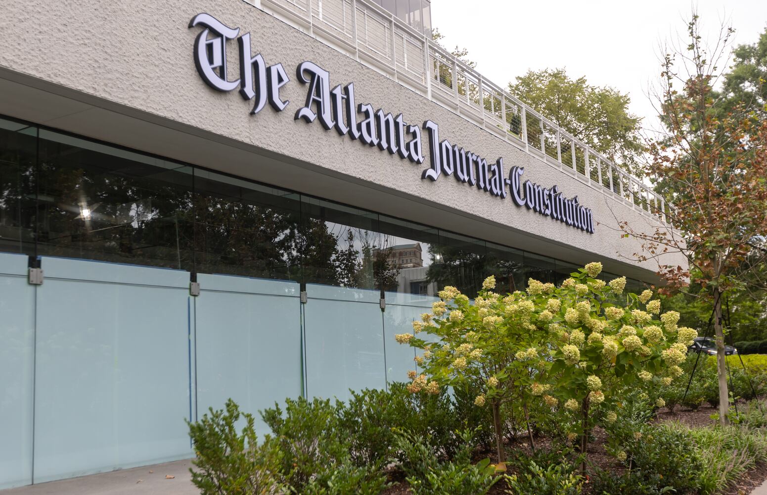 The Atlanta Journal-Constitution marquis is installed and up on Peachtree Street at Colony Square. (John Spink/AJC)