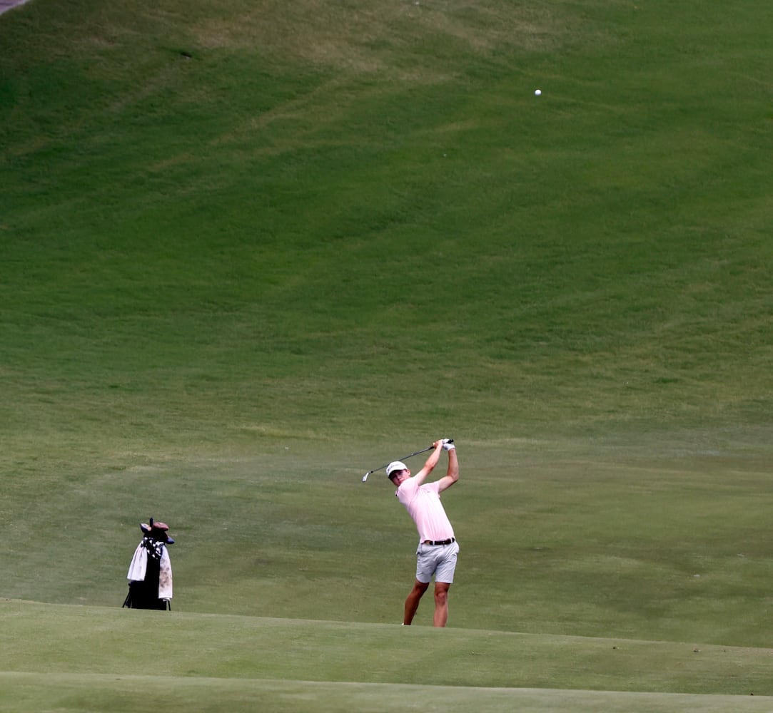 Harris Barth, Committed - Furman University, who finished 14 under par for fourth place, hits his fairway shot on seven during the final round of the Dogwood Invitational Golf Tournament in Atlanta on Saturday, June 11, 2022.   (Bob Andres for the Atlanta Journal Constitution)