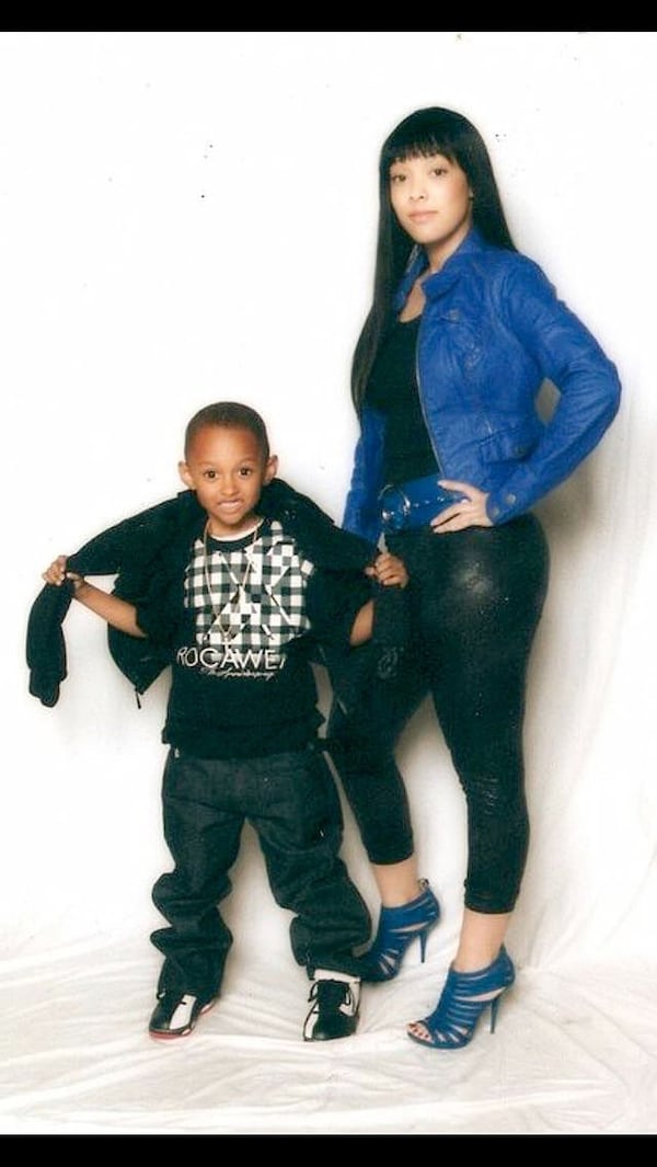 Janae Rice, shown with son A.J., was killed Sunday when she was hit by man attempting to flee a traffic stop, according to police. (Family photo)