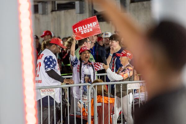 Supporters wait in line for a security check outside a rally for Republican presidential candidate and former president Donald Trump at Forum River Center in Rome on Saturday, March 9, 2024. (Arvin Temkar / arvin.temkar@ajc.com)