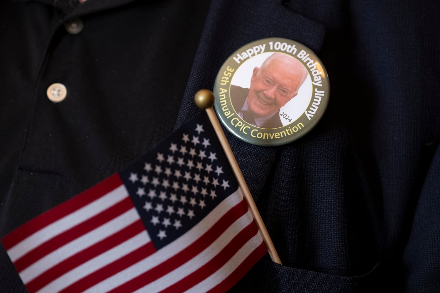 People attend a Naturalization ceremony at Jimmy Carter National Historic Park in Plains on Tuesday, Oct. 1, 2024. The ceremony was held in honor of President Carter’s 100th birthday.  Ben Gray for the Atlanta Journal-Constitution