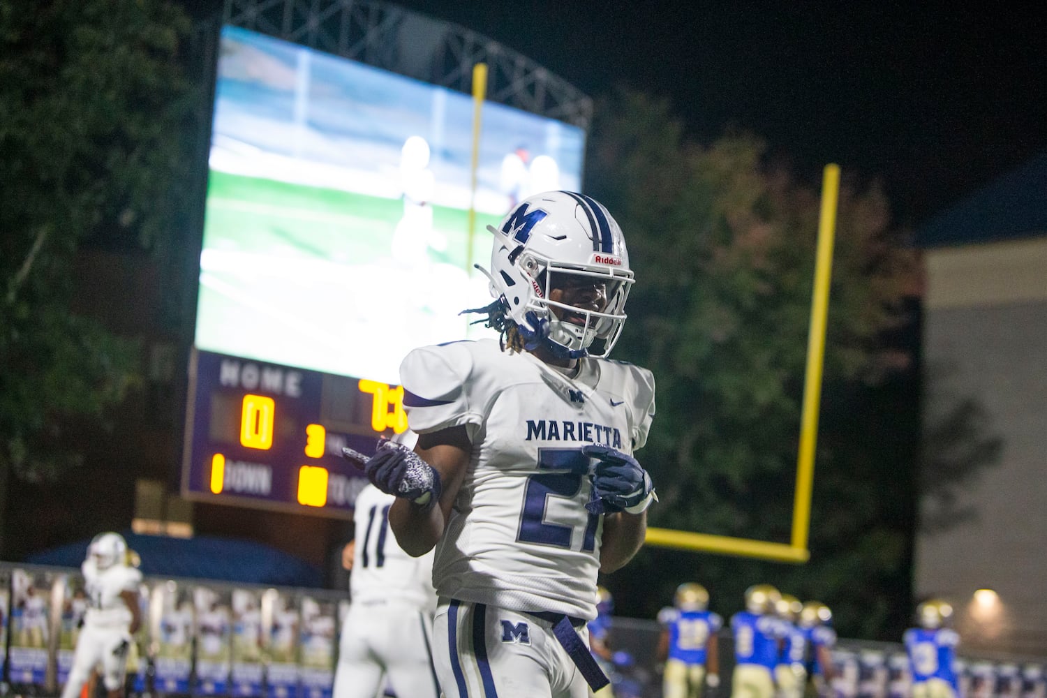 Marietta's Jace Arnold celebrates his touchdown during the Marietta vs. McEachern High School Football game on Friday, October 14, 2022, at McEachern High School in Powder Springs, Georgia. Marietta defeated McEachern 34-16. (Christina Matacotta for the AJC)