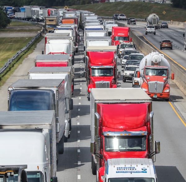 September 14, 2020 Conyers: I-20 eastbound traffic is locked at Evans Mill Road in Lithonia because of a chemical plant fire in Conyers. Rockdale fire officials told Channel 2 Action News that about a dozen pallets of dry chemicals were burned, at BioLab in Conyers and that crews had to remove the material from the building on Monday, Sept. 14, 2020 to get to it safely. BioLab, which has had operations in Conyers since 1973, houses production and storage space for pool and spa water-treatment chemicals, according to the company. All lanes of I-20 in both directions were closed throughout most of the day. The fire was at least the third blaze at the facility since 2004. The one on May 25, 2004, set off multiple explosions and prompted the evacuation of hundreds of residents, The Atlanta Journal-Constitution previously reported. Residents were evacuated again after a chemical fire June 4, 2016. Monday’s fire did not prompt any evacuations. “We are investigating a chemical reaction that occurred at our BioLab facility in Conyers, GA due to water exposure, leading to smoke over Interstate 20," the company said in an emailed statement. “We are not aware of any injuries and have confirmed there is no fire at the facility. Our management team is on the scene, working with first responders and local authorities to assess and contain the situation.” The company said it has notified the U.S. Chemical and Safety Hazard Investigation Board and will provide additional updates “as appropriate.” (John Spink / John.Spink@ajc.com)

