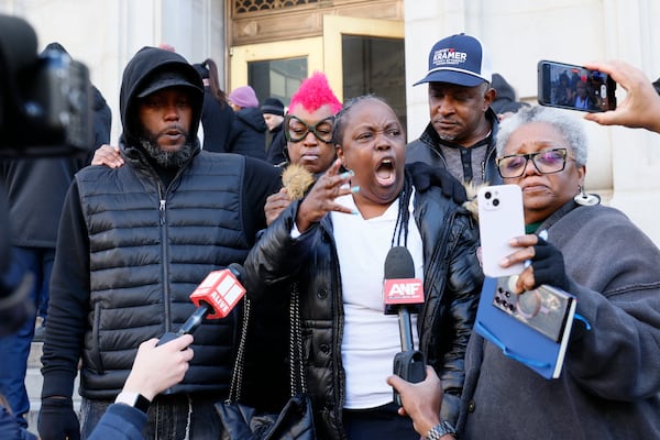 Tasha Kendrick, the mother of Deamonte Kendrick, reacts with emotion as she speaks to press members outside the Fulton County Superior Court on Tuesday, December 3, 2024. Shannon Stillwell and Deamonte Kendrick, the two remaining “Young Slime Life,” trial were acquitted of murder charges.
(Miguel Martinez / AJC)