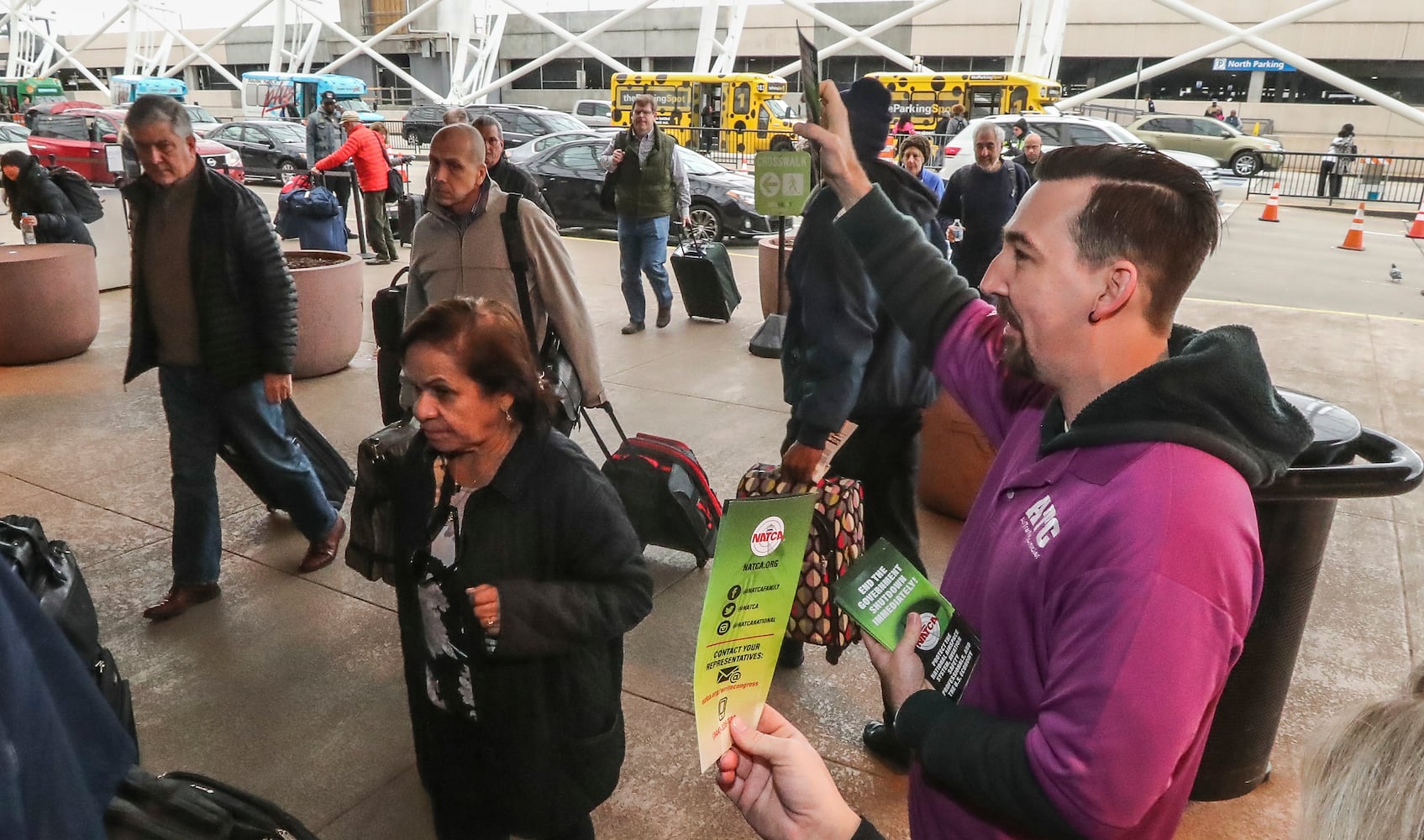 PHOTOS: Atlanta airport travelers stuck in long TSA wait lines