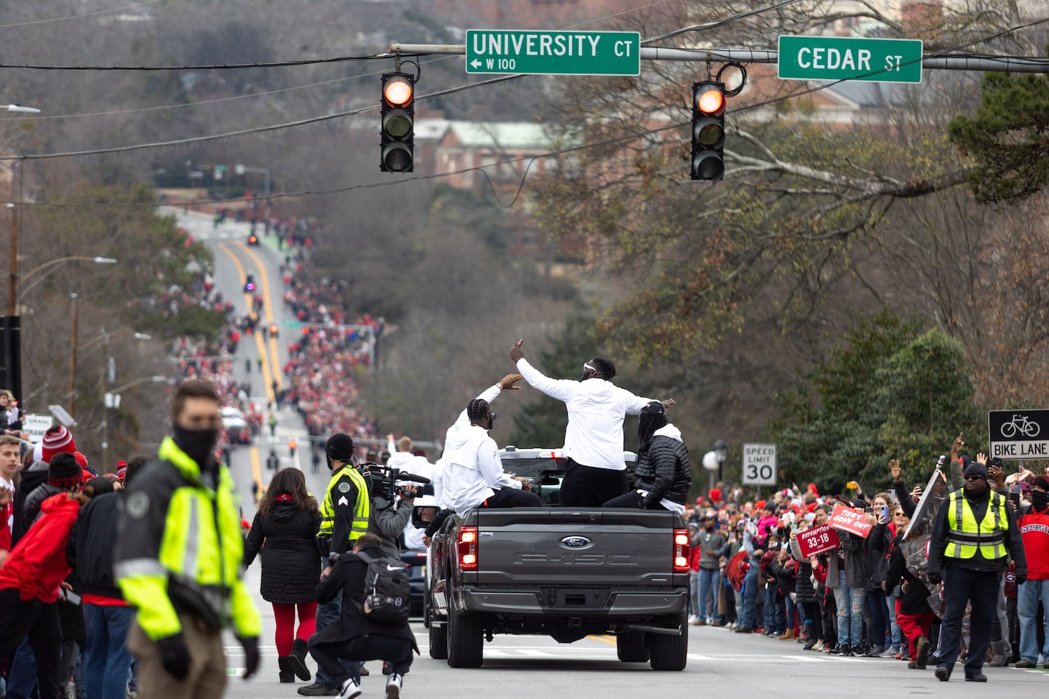 Players travel down Lumpkin Street during the UGA National Championship Celebration Parade in Athens, GA., on Saturday, January 15, 2022. (Photo/ Jenn Finch)