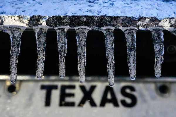 Icicles hang down from a vehicle during an icy winter storm in Galveston, Texas, Tuesday, Jan. 21, 2025. (Brett Coomer/Houston Chronicle via AP)