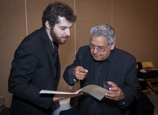 Bassist Daniel Tosky (left) consults with Juan Ramirez before a performance. Contributed by Steve Schaefer