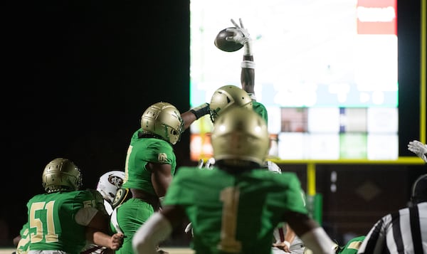 Buford blocks a field goal at the Buford/Mill Creek football game(Photo Jamie Spaar for The Atlanta Journal-Constitution)