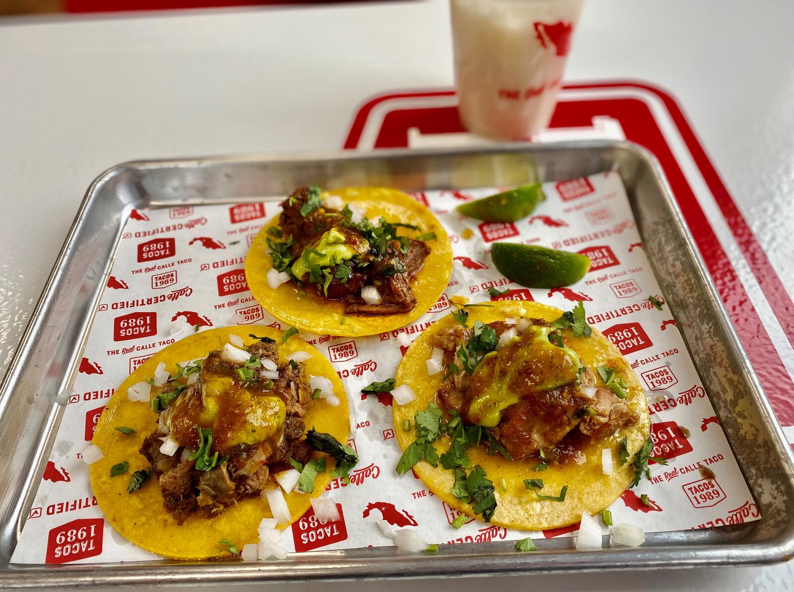 Tacos 1989 in Buford specializes in street tacos, such as birria (top), lengua (bottom left) and carnitas (bottom right). (Wendell Brock for The Atlanta Journal-Constitution)