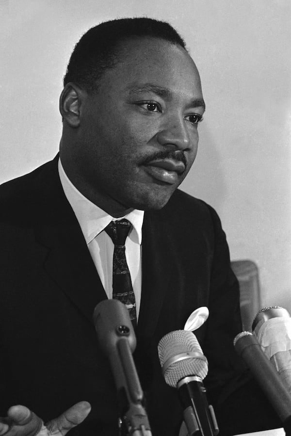 FILE - Martin Luther King at press conference after talk with Ambassador Arthur Goldberg at the U.S. Mission to U.N., in New York on Sept. 10, 1965. (AP Photo/Dave Pickoff, File)