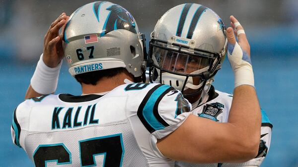 Ryan Kalil  and Cam Newton share the love.