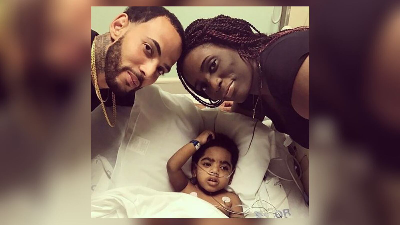 Two-year-old AJ Burgess with his parents, Carmellia Burgess and Anthony Dickerson. (Family photo)