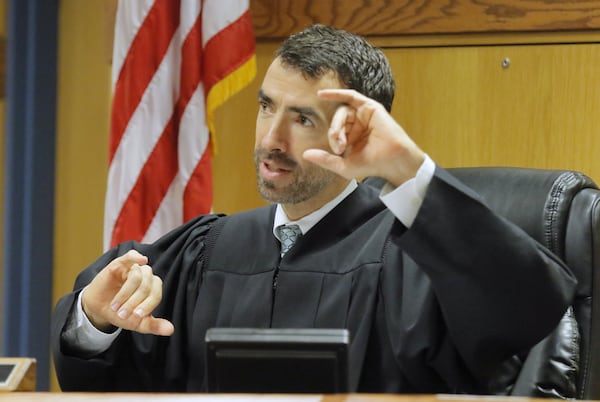 Judge Robert McBurney during discussions with attorneys at Thursday’s hearing. McBurney will preside over McIver’s murder trial. BOB ANDRES /BANDRES@AJC.COM