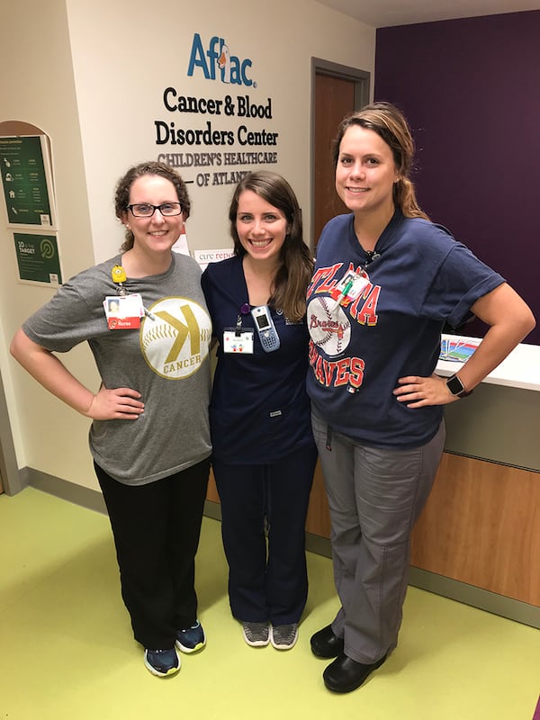 Bridget Sandy (left) has been working at the Aflac Cancer and Blood Disorders Center at Children's Healthcare of Atlanta for five years. It's the same unit where she was treated as a child.
Photo courtesy of Bridget Sandy