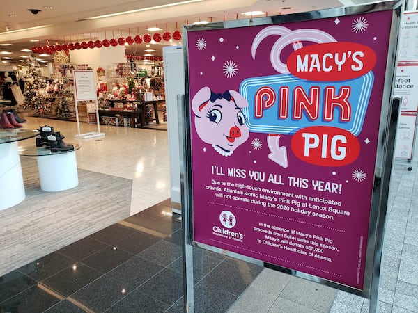 The Macy's Pink Pig ride at Lenox Square mall in Atlanta has been put on hold, one of the many pandemic-related shifts made in the holiday shopping scene this year. MATT KEMPNER / AJC