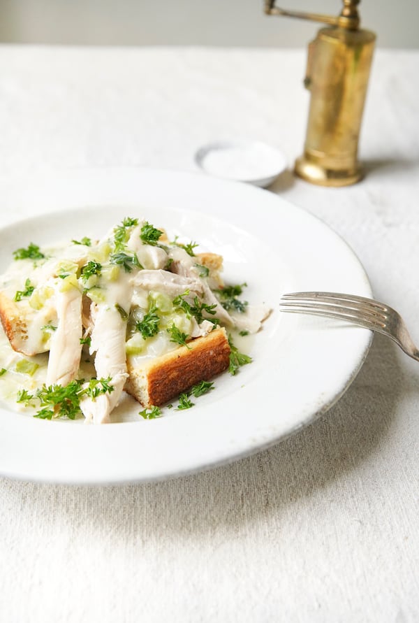 Nashville Chicken on Egg Bread features poached chicken, eggy cornbread and a cream sauce. The dish was popular at Kleeman’s, a Nashville, Tennessee, restaurant in the 1940s and ‘50s. (Courtesy of Harper Celebrate/Rinne Allen)