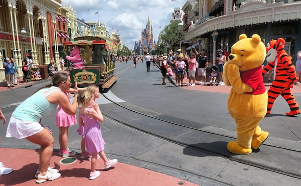 Visitors who aren’t fully vaccinated still will need to wear face masks indoors and on all rides and attractions. All visitors, whether vaccinated or not, will still be required to wear face coverings on buses, monorails and Disney Skyliner, the resort’s aerial gondola, according to the latest guidelines. (Joe Burbank/Orlando Sentinel/TNS)