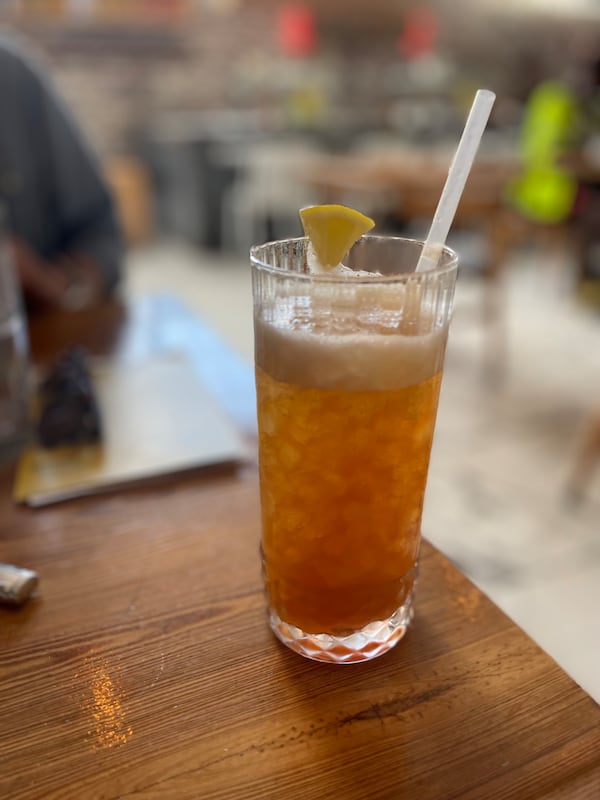 The peach and bay leaf iced tea at Kirkwood's Fishmonger is  perfect for pairing with patio oysters. A spirit can be added. (Angela Hansberger for The Atlanta Journal-Constitution)