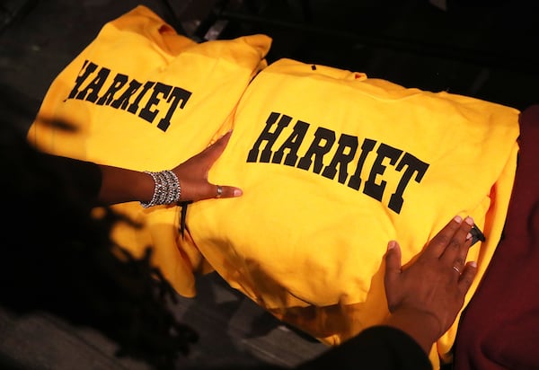 Owner Lakeysha Hallmon sets out Harriett sweat shirts from the Freedom Company while preparing to open her store The Village at Ponce City Market on Monday, Nov 23, 2020, in Atlanta.   “Curtis Compton / Curtis.Compton@ajc.com”