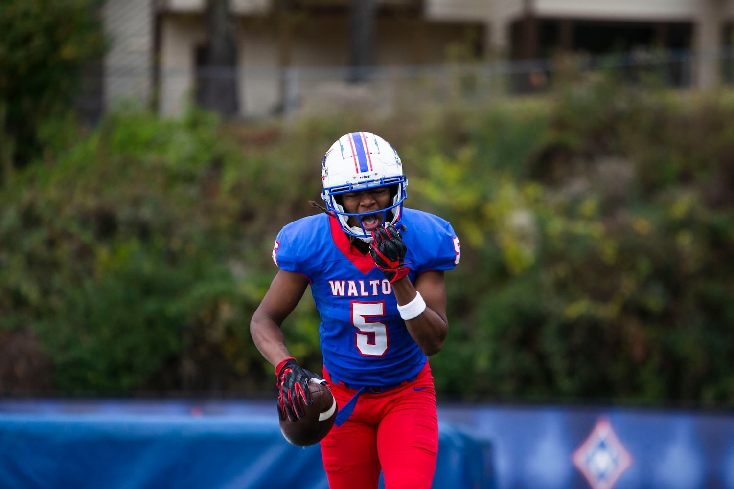 Ayden Jackson, senior on the  Walton football team, celebrates a great catch on Saturday, November 12, 2022, at Walton High School. CHRISTINA MATACOTTA FOR THE ATLANTA JOURNAL-CONSTITUTION.