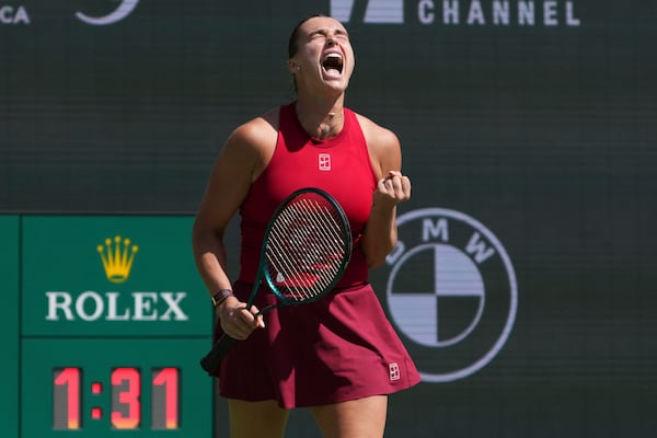 Aryna Sabalenka, of Belarus, reacts after winning a point over Mirra Andreeva, of Russia, during the final match at the BNP Paribas Open tennis tournament Sunday, March 16, 2025, in Indian Wells, Calif. (AP Photo/Mark J. Terrill)