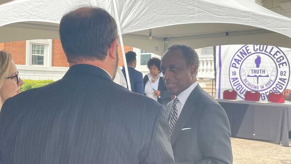 Paine College board chairman Michael Thurmond, who is also chief executive officer of DeKalb County government, speaks to Bank of America Augusta and Aiken President Ora Parish during an event at the college Tuesday, June 20, 2023. Bank of America is one of several organizations that's committed to provide support to help the college improve its academic programs and facilities. (Toni Odejimi/toni.odejimi@ajc.com)