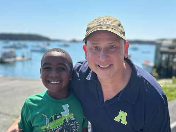 Adam Kulbersh (right) came up with the idea for Project Menorah when his son Jack Kulbersh (left) wanted to decorate for the holidays. Photo: courtesy Adam Kulbersh