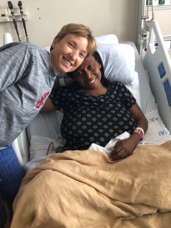 Cathie Seibert (left) bids farewell to Dr. Carla Neal-Haley five days after donating part of her kidney to Neal-Haley. CONTRIBUTED