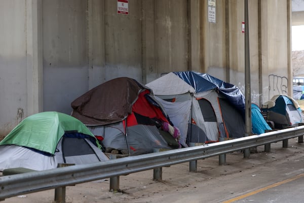 A homeless encampment is shown at Pryor Street under the I-20 overpass, Thursday, February 22, 2024, in Atlanta. (Jason Getz / jason.getz@ajc.com)