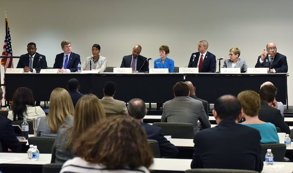 Following the general election, then-City Council member Kwanza Hall endorsed Keisha Lance Bottoms in the runoff. The candidates are pictured here in early 2017. From left: Ceasar Mitchell, Atlanta City Council president, Peter Aman, former chief operating officer, Keisha Lance Bottoms, Atlanta City Council member, Kwanza Hall, Atlanta City Council member, Mary Norwood, Atlanta City Council member, Michael Sterling, former Executive Director of the Atlanta Workforce Agency, Cathy Woolard, former Atlanta City Council member and president, and Vincent Fort, state senator. HYOSUB SHIN / HSHIN@AJC.COM