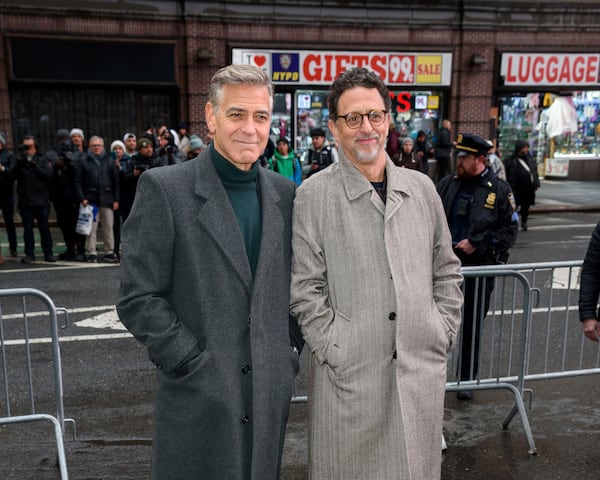 FILE - George Clooney, left, and Grant Heslov appear at the "Good Night, and Good Luck" Broadway cast announcement at the Winter Garden Theatre on Feb. 6, 2025, in New York. (Photo by Christopher Smith/Invision/AP, File)