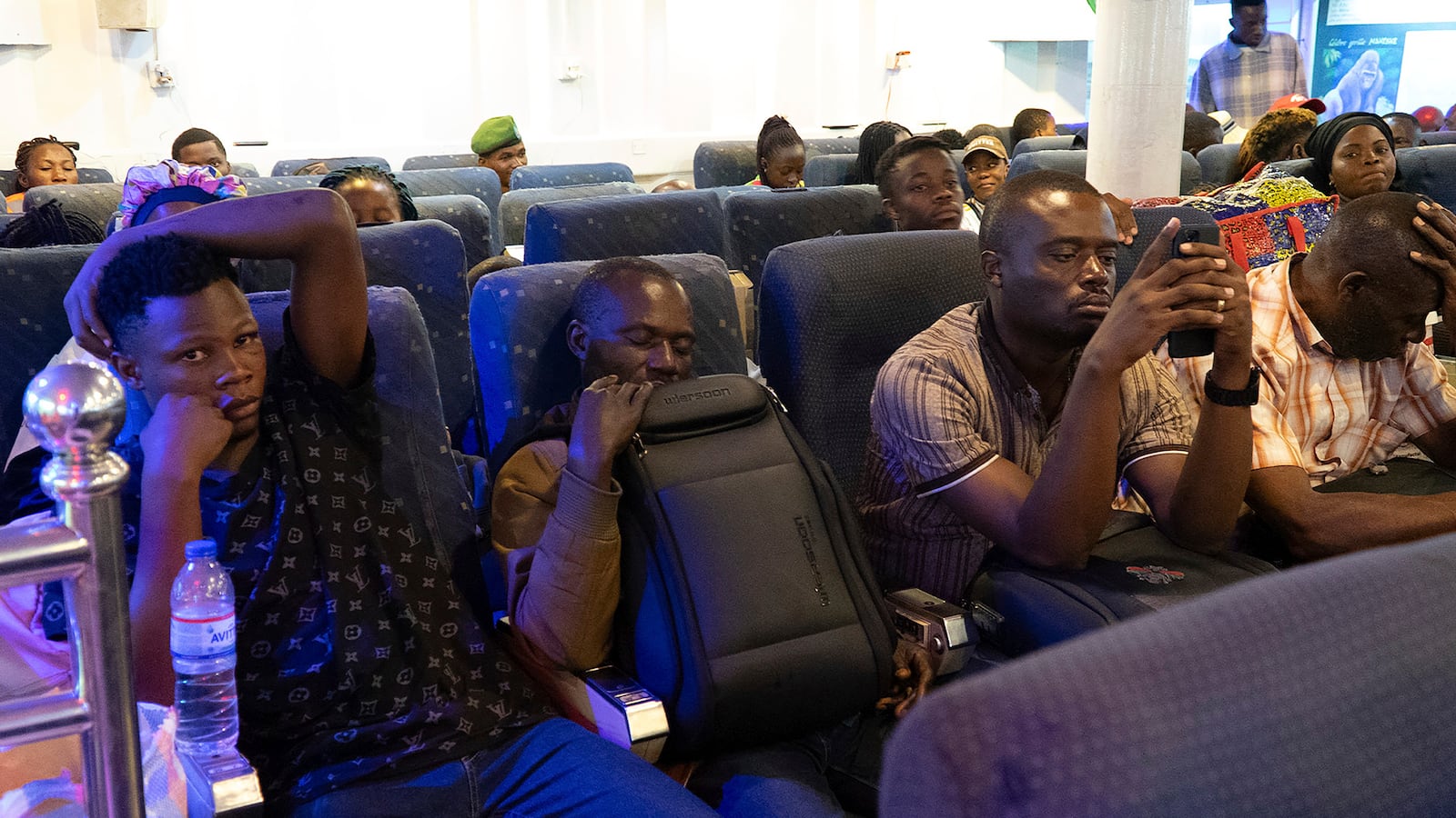 Passengers sit aboard the Emmanuel 2 ferry, linking Goma to Bukavu on lake Kivu, in Goma, Congo Tuesday, Oct. 8, 2024. (AP Photo/Justin Kabumba)