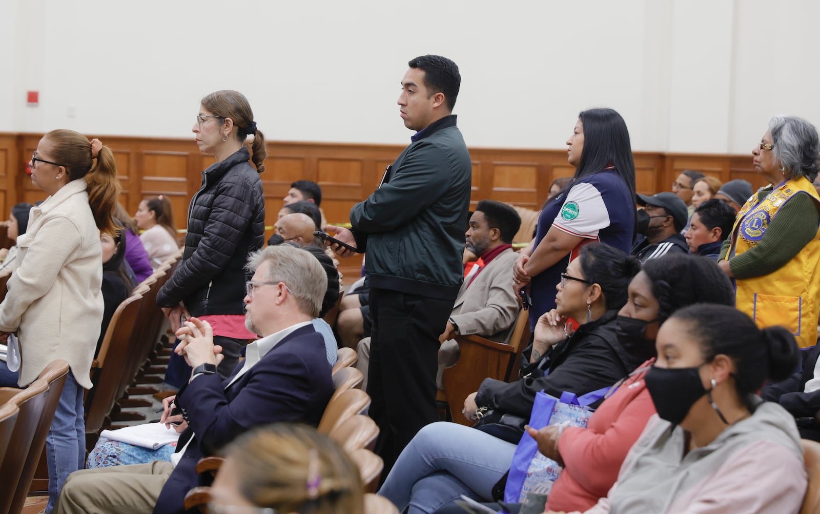 Members of the Gwinnett community wait in line to ask questions during a town hall addressing youth violence at Universal Church in Norcross on Thursday, March 9, 2023. (Natrice Miller/ Natrice.miller@ajc.com)