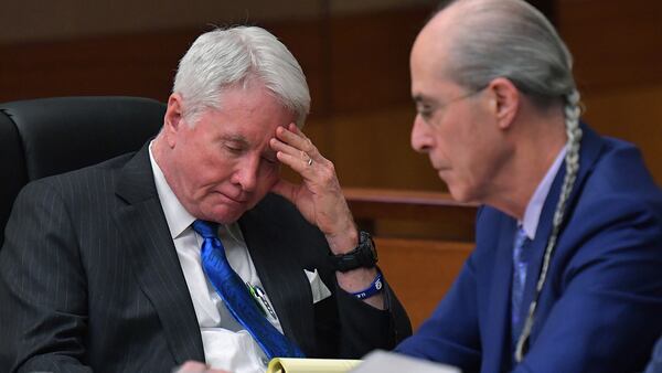 March 13, 2018 Atlanta - Tex McIver (left) listens to testimony last week with his defense attorney Bruce Harvey . HYOSUB SHIN / HSHIN@AJC.COM