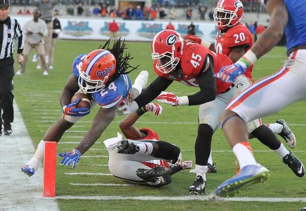 Florida's Matt Jones rushes for some of his 192 yards. (Brant Sanderlin/AJC photo)