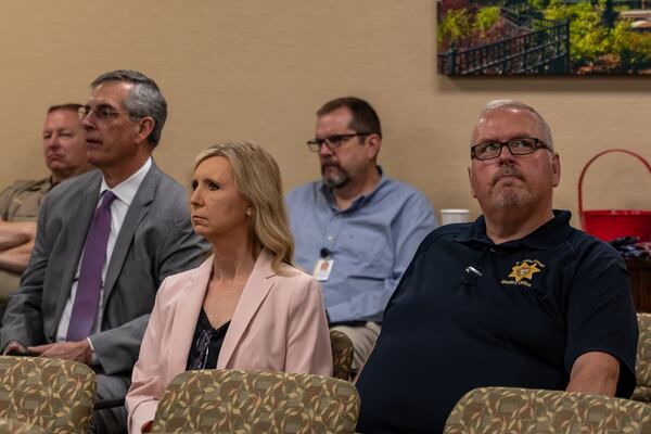 Members from various counties listen to the guest speaker during a table talk session regarding election security Friday in Dallas. (Atlanta Journal-Constitution/Jason Allen)