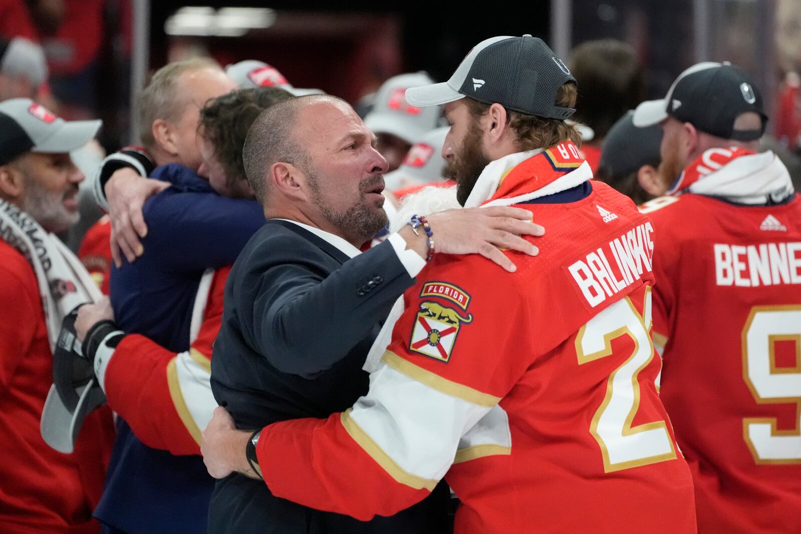 FILE - Florida Panthers general manager Bill Zito talks to defenseman Uvis Balinskis (26) after Game 7 of the NHL hockey Stanley Cup Final against the Edmonton Oilers, on June 24, 2024, in Sunrise, Fla. (AP Photo/Wilfredo Lee, File)