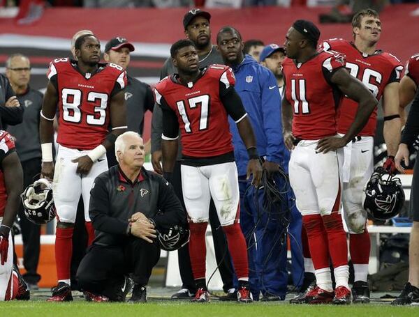 The winning kick sails home, and Julio Jones is not amused. (Matt Dunham/AP photo)