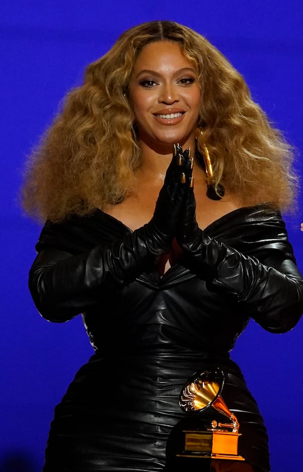 Beyonce accepts the award for best rap song for "Savage" at the 63rd annual Grammy Awards at the Los Angeles Convention Center on Sunday, March 14, 2021. (AP Photo/Chris Pizzello)