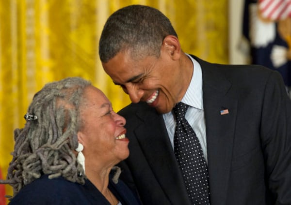 President Barack Obama looks to author Toni Morrison before awarding her the Presidential Medal of Freedom on May 29, 2012, in the East Room of the White House in Washington. (AP Photo/Carolyn Kaster)