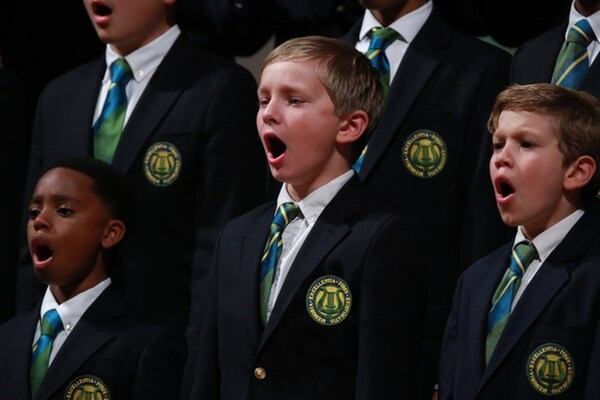 Members of the Georgia Boy Choir perform at an Atlanta event before departing for a 2016 tour to Spain and Portugal. Pictured (left to right) are Alex McGruder, Patrick Jones and Charlie Suazo. CONTRIBUTED