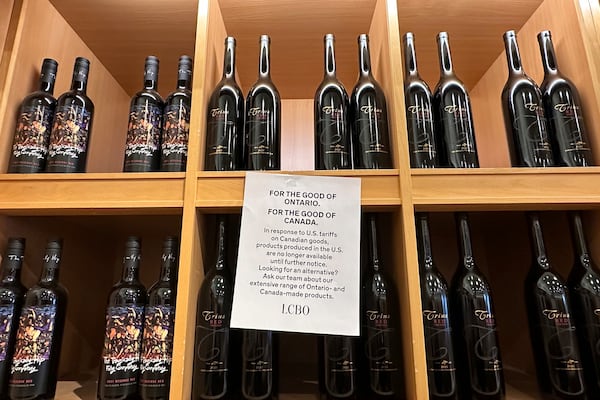 A sign is posted on a wine shelves at an LCBO, the government-run liquor stores where most wine and spirits in the province are purchased, Sunday, March 9, 2025, in Toronto. (AP Photo/Jill Colvin)