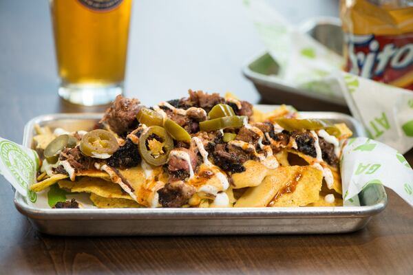  BBQ Nachos with chopped brisket, signature BBQ sauce, cheese, jalapenos and sour cream.Photo credit-Mia Yakel.