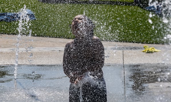 Devonte Tucker Jr.-6, a kindergartener with Wesley International Academy enjoyed the spray of cool water at the splash pad at Rodney Cook Sr. Park in Historic Vine City as he and his classmates enjoyed a field trip to the park while Georgia Milestone testing continues at the school. Metro Atlanta is looking for rain showers over the weekend. ÒPretty much every day all the way through the next week is going to have at least some chance for some scattered to isolated showers and storms,Ó Channel 2 Action News meteorologist Brian Monahan said. ÒAlmost kind of a summertime pattern.Ó Temperatures will feel more like the start of summer, too. WeÕll take a dip into the upper 70s for a high on Saturday, but weÕll climb back into the low to mid 80s by Sunday and gradually increase each day next week. By Wednesday, projected highs will be in the upper 80s. (John Spink/AJC)