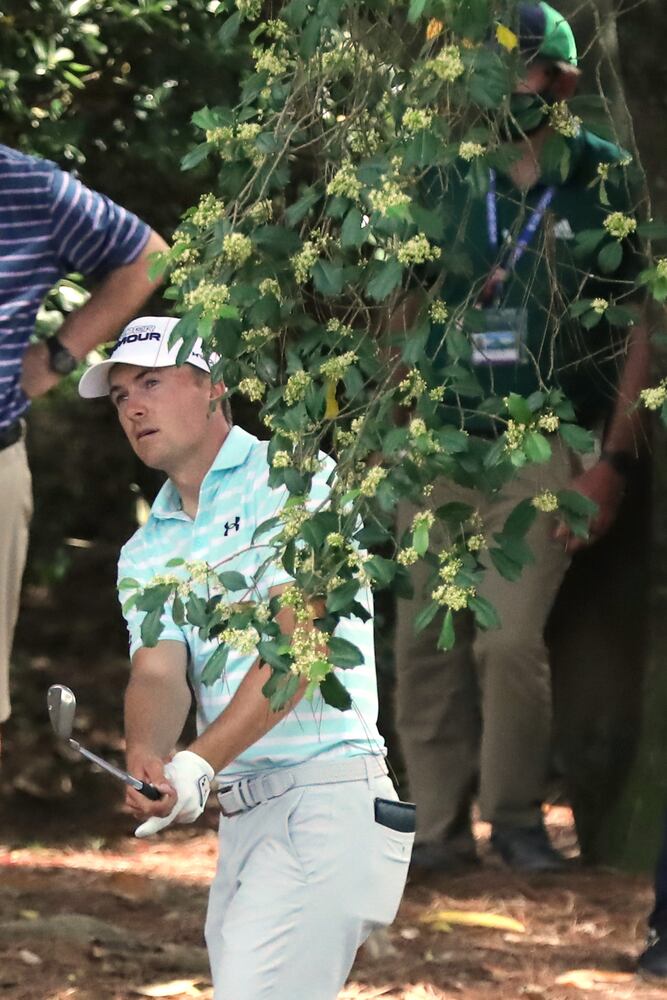 April 10, 2021, Augusta: Jordan Spieth hits out of the rough on the eighth hole during the third round of the Masters at Augusta National Golf Club on Saturday, April 10, 2021, in Augusta. Curtis Compton/ccompton@ajc.com