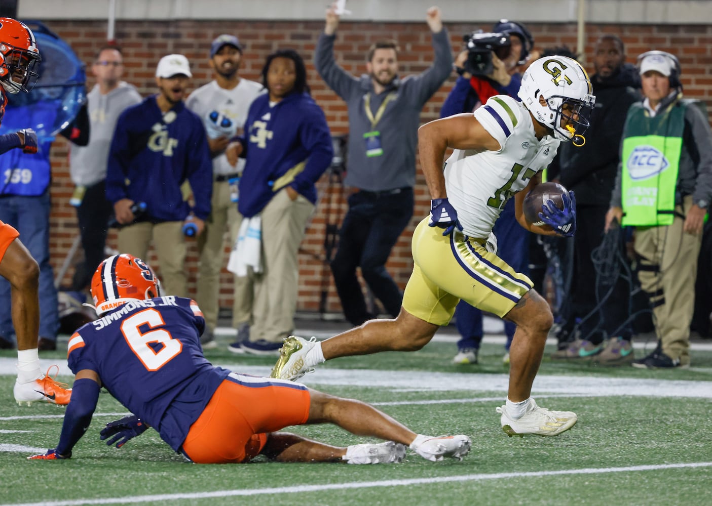 Georgia Tech Yellow Jackets wide receiver Dominick Blaylock (12) runs for a touchdown after a catch during the first half of an NCAA college football game between Georgia Tech and Syracuse in Atlanta on Saturday, Nov. 18, 2023. The Jackets won 31-22. (Bob Andres for the Atlanta Journal Constitution)