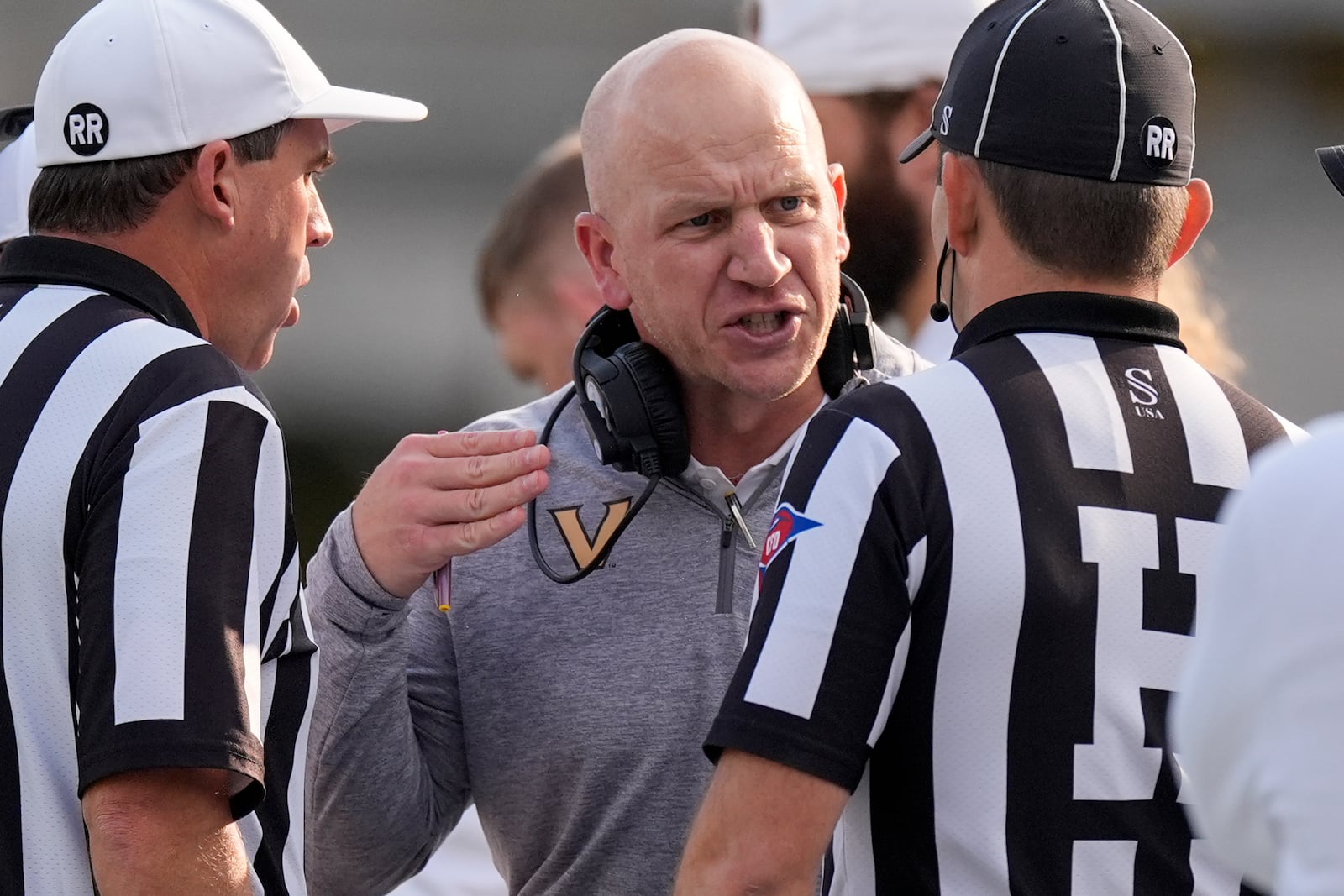 Vanderbilt head coach Clark Lea argues with officials on the sideline during the first half of an NCAA college football game against Texas, Saturday, Oct. 26, 2024, in Nashville, Tenn. (AP Photo/George Walker IV)