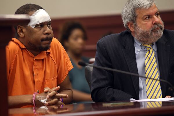 Atlanta criminal defense lawyer Don Samuel, with former Atlanta Hawks star Mookie Blaylock, who was charged with vehicular homicide. BEN GRAY / BGRAY@AJC.COM