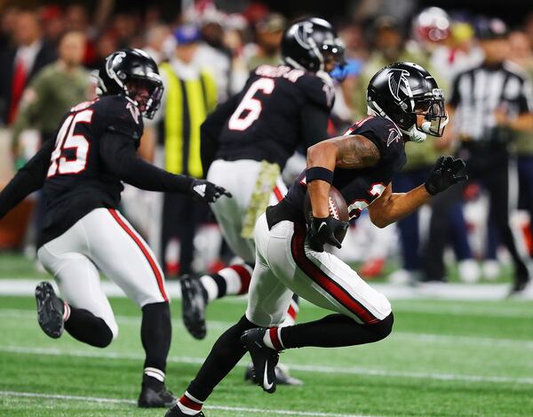 111821 Atlanta: Falcons cornerback A.J. Terrell intercepts Patriots quarterback Mac Jones during the third quarter in a NFL football game on Thursday, Nov. 18, 2021, in Atlanta.    “Curtis Compton / Curtis.Compton@ajc.com”